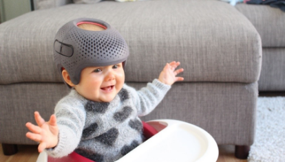 Baby wearing helmet