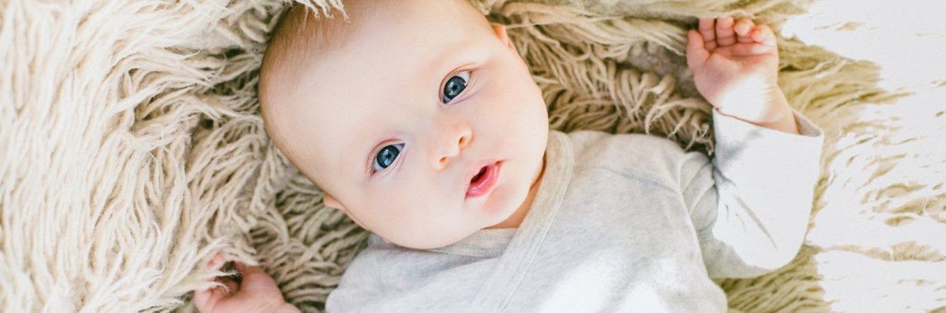 Baby with head tilt to one side 